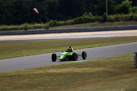 car-green-11-blueandorangehelmet