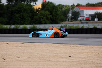 blue and orange Racecar number 7