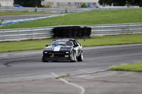 black and white race car number 342-9