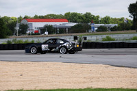 black and white race car number 342-4
