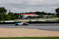 blue and orangerace car number 7_