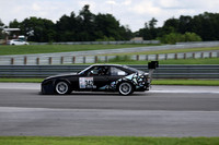 black and white race car number 342-3