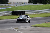 black and white race car number 342-8